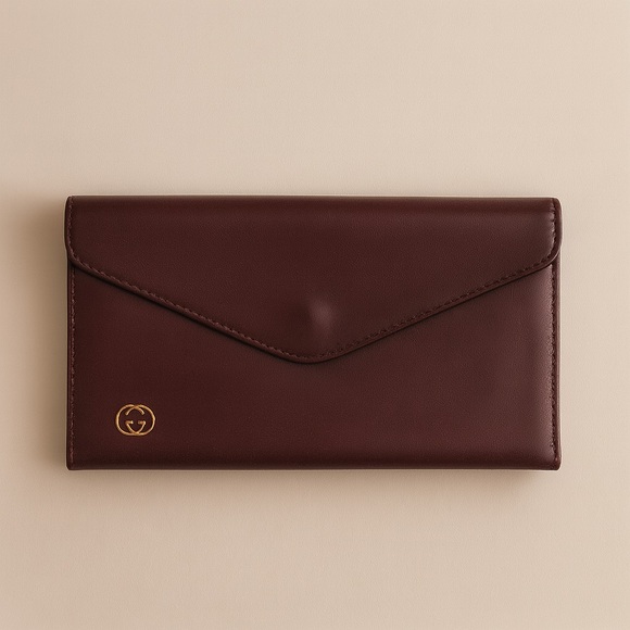 Gucci Handbags - GUCCI Vintage Burgundy Leather Envelope Wallet Clutch Gold Logo